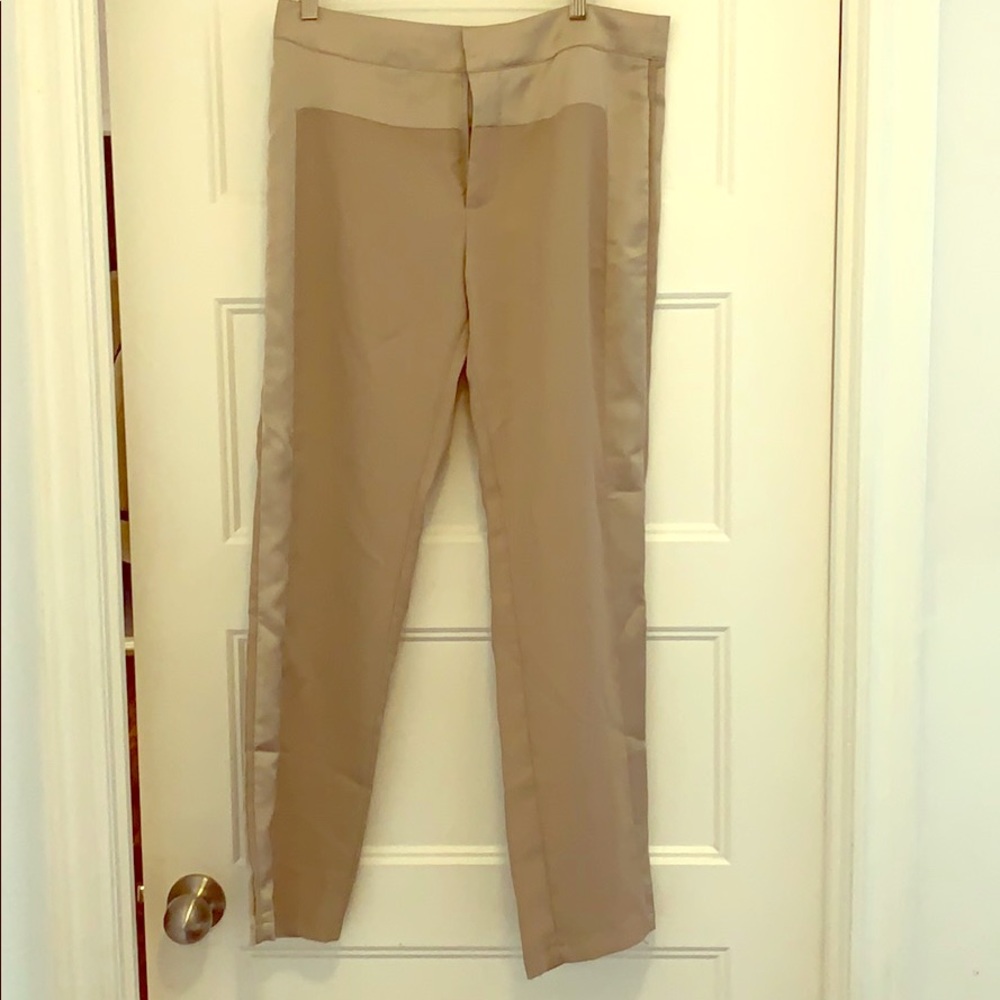 Parker champagne coloured pants with tags on